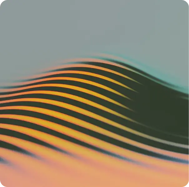 Abstract wavy lines in black and orange gradient with a blurred gray background.